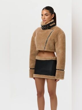 Reversible Faux Shearling Crop Moto Jacket
Naked Wardrobe size Large